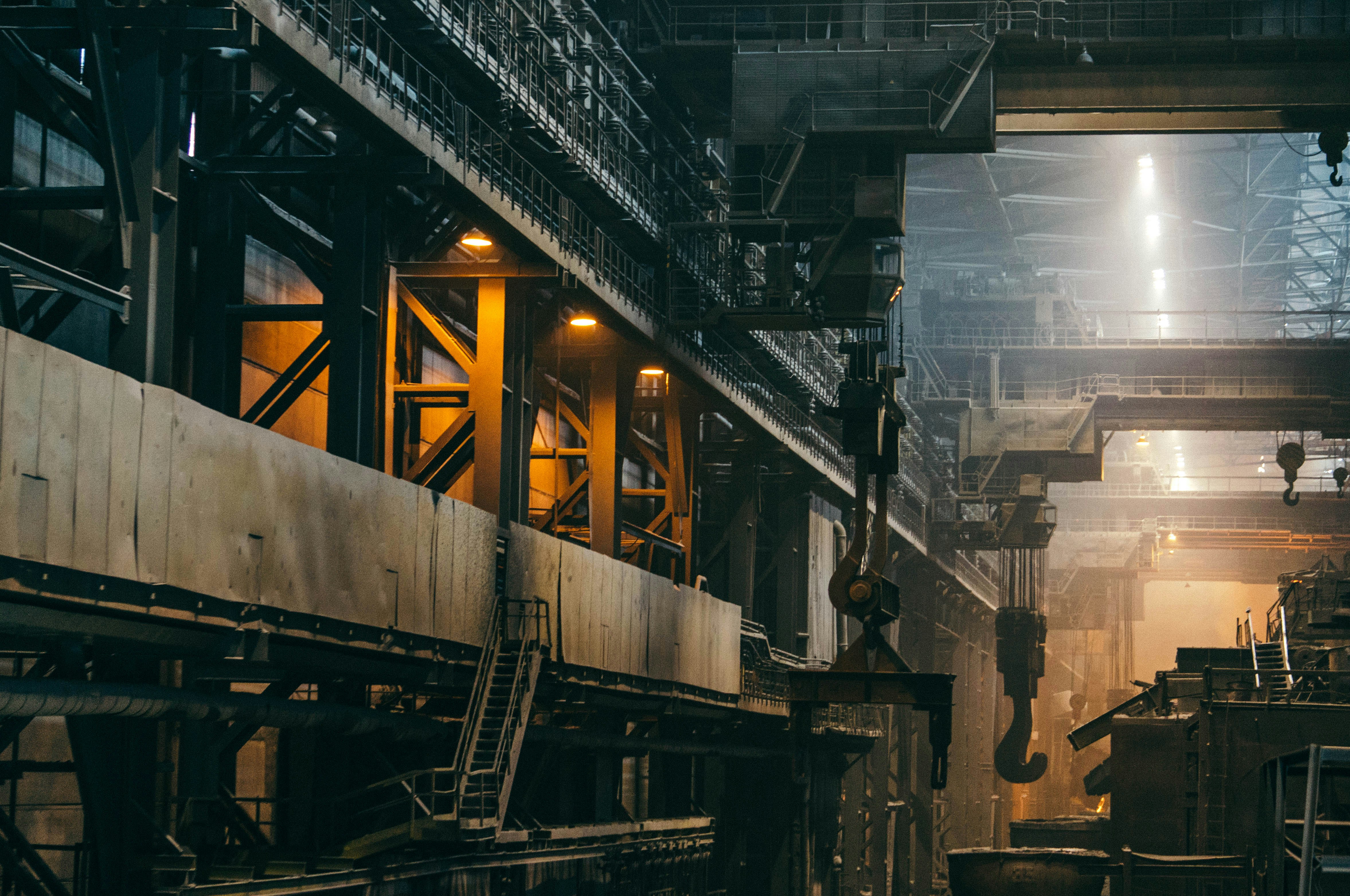 An empty, darkly lit factory.