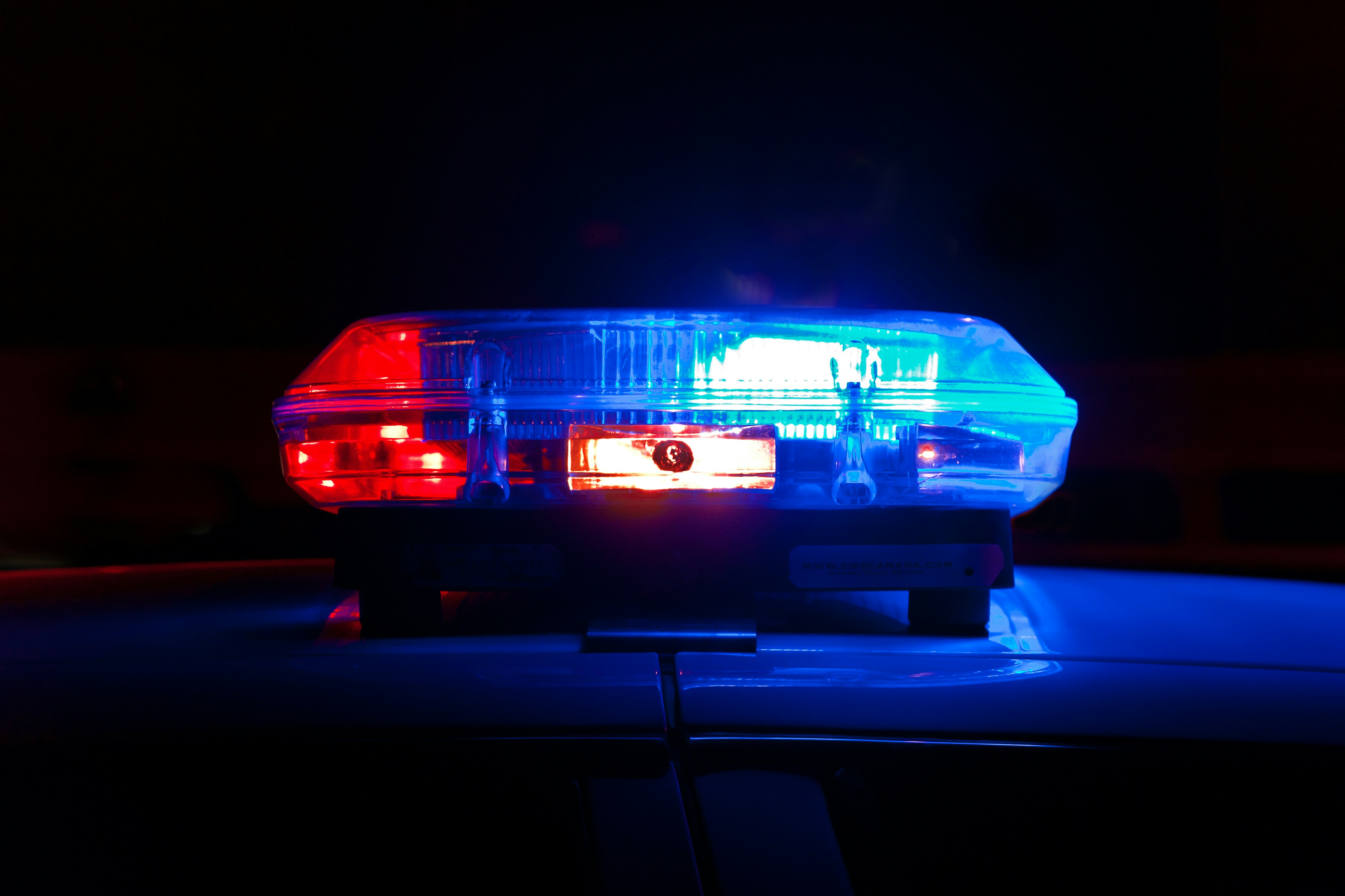 A police lightbar on a car.